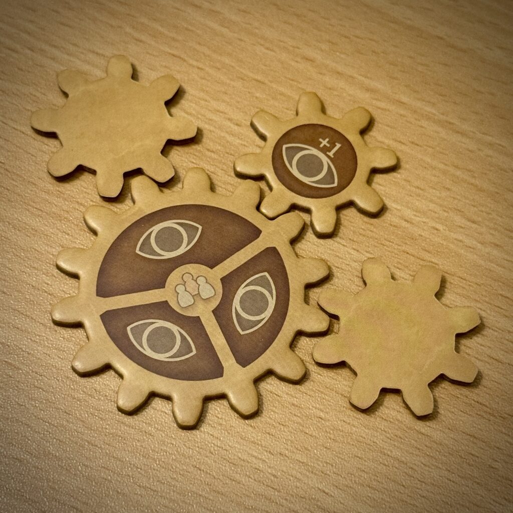 Vous pouvez poser face visible autant de cartes que d'œil. Et à chaque horloge ratée, vous gagnez un œil.